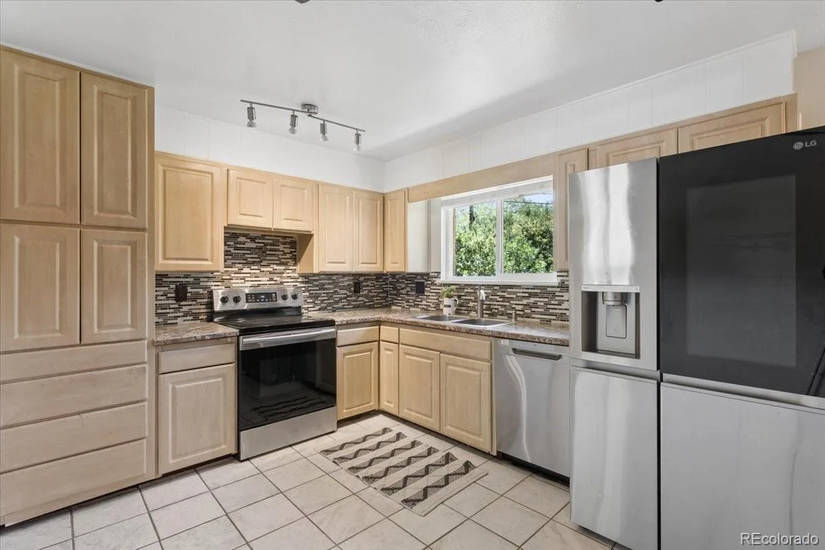 1477 S Brentwood Street Lakewood CO 80232 | MLS #REC8784669 08222026165715 1200 3