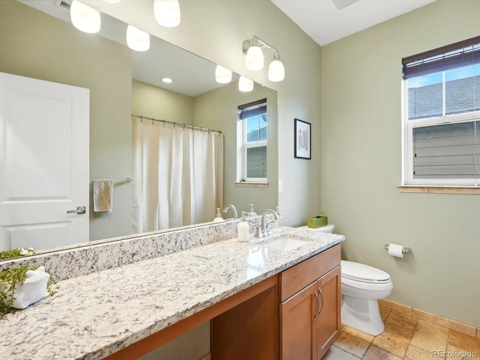 14941 W 70th Avenue Arvada CO 80007 MLS #REC8786878 05202026195543 1600 9