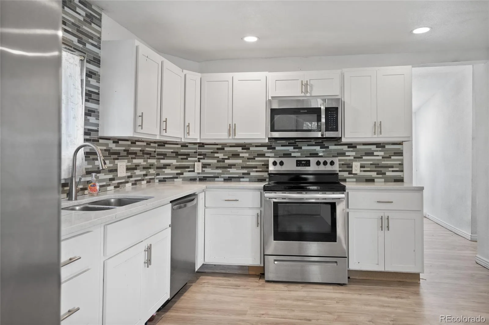 7878 Lowell Boulevard Westminster CO 80030 | MLS #REC8832888 08202026173018 1600 4