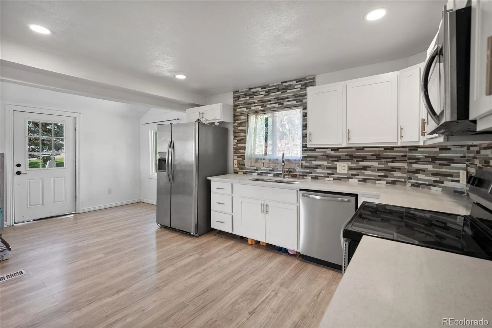 7878 Lowell Boulevard Westminster CO 80030 | MLS #REC8832888 08202026173018 1600 6
