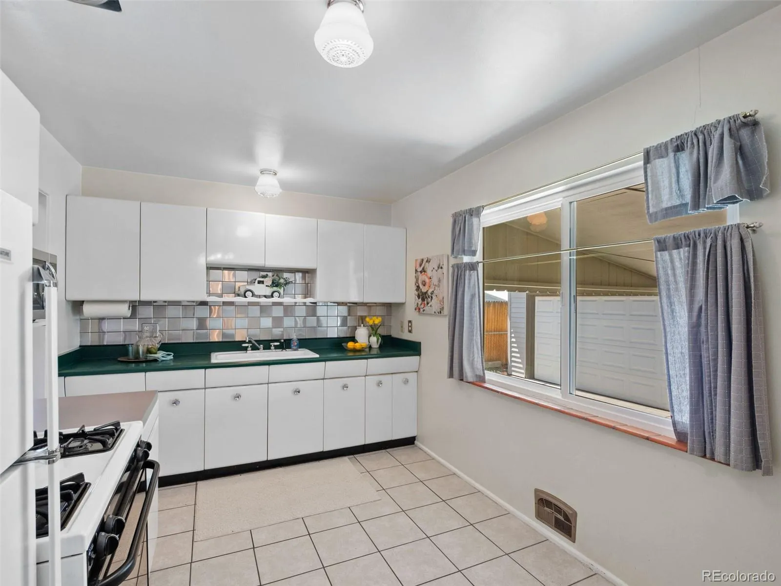 1867 S Tennyson Street Denver CO 80219 MLS #REC8861339 05132026212817 1600 9