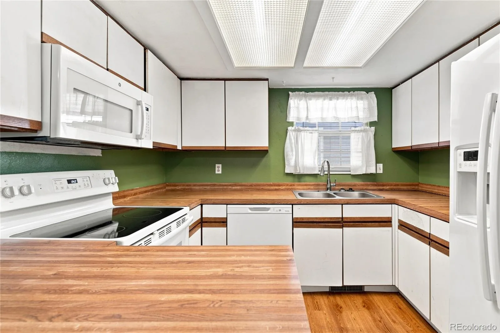 12573 E Pacific Circle #E Aurora CO 80014 | MLS #REC8881850 09132026005539 1600 12