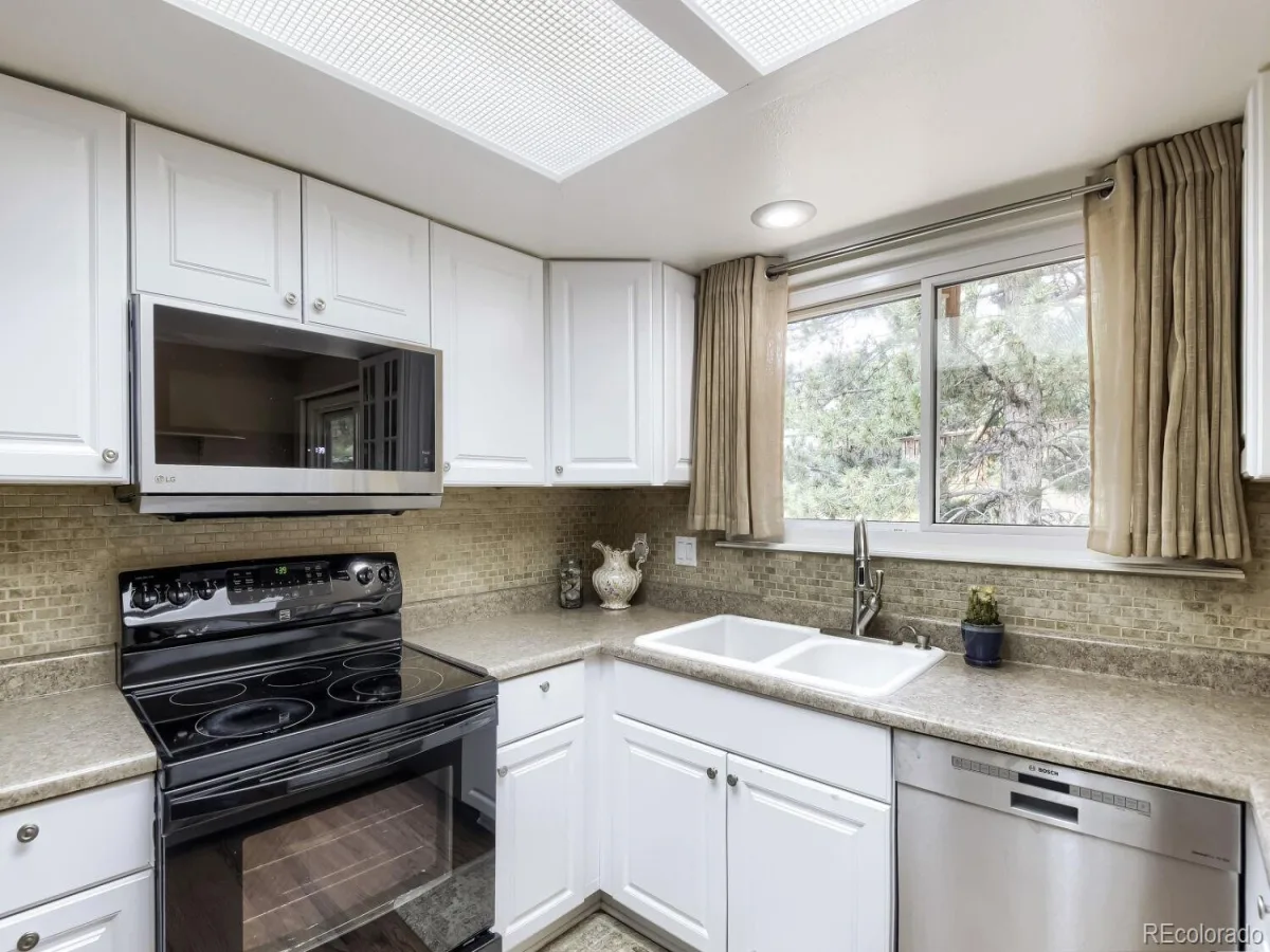 9062 Woodland Drive Littleton CO 80126 | MLS #REC8963066 08072026203334 1200 9