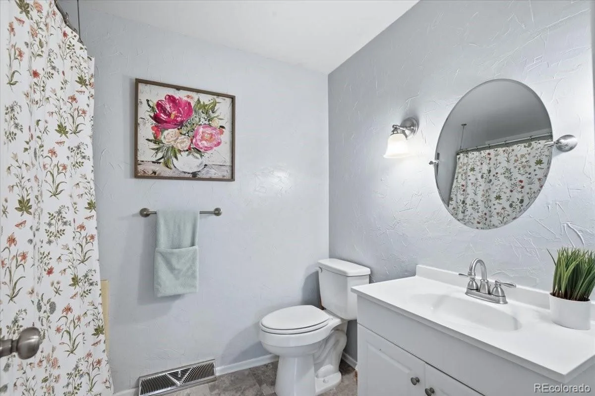 9837 W Arizona Avenue Lakewood CO 80232 | MLS #REC9038413 07302026031527 1200 9