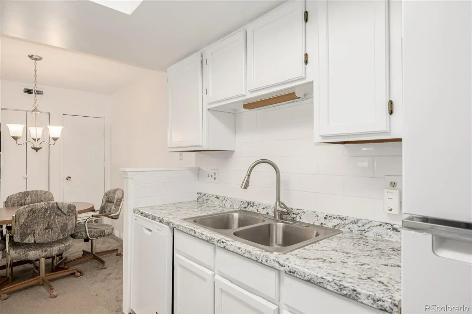 8335 Fairmount Drive #4-102 Denver CO 80247 MLS #REC9053583 03042026174029 1600 2