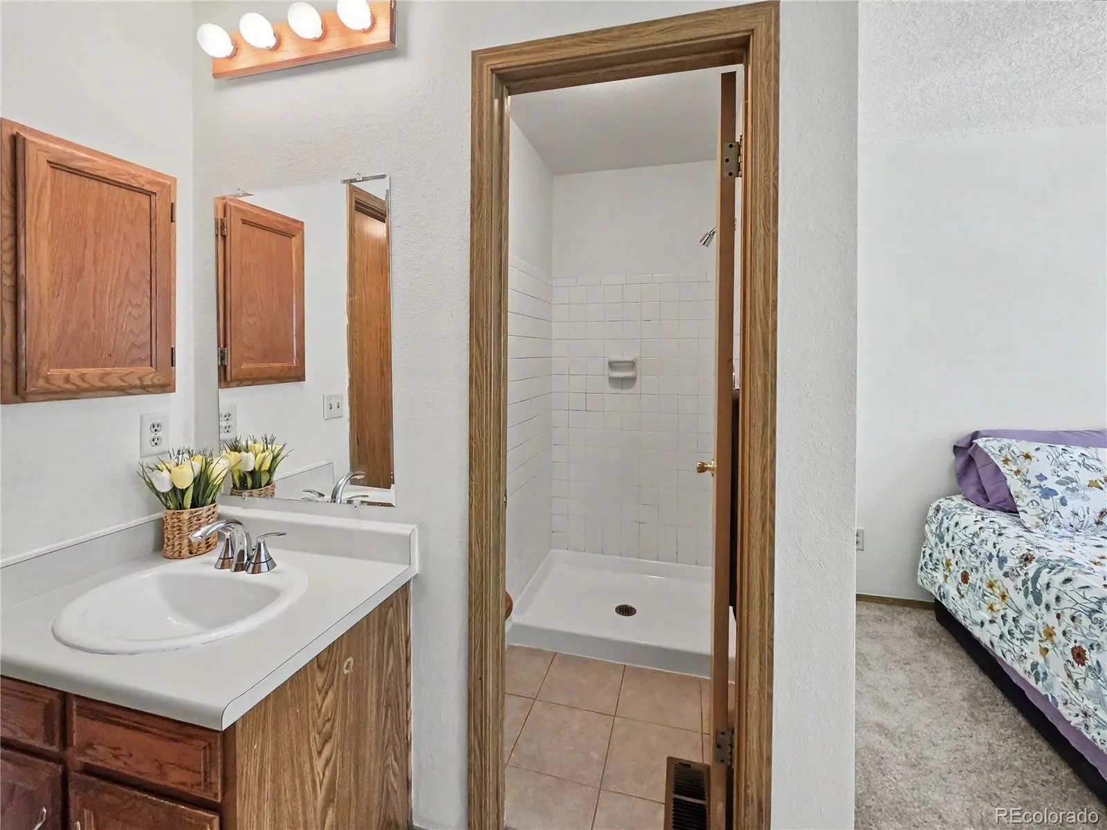 1699 S Trenton Street #8 Denver CO 80231 MLS #REC9053987 05022026060549 1600 19