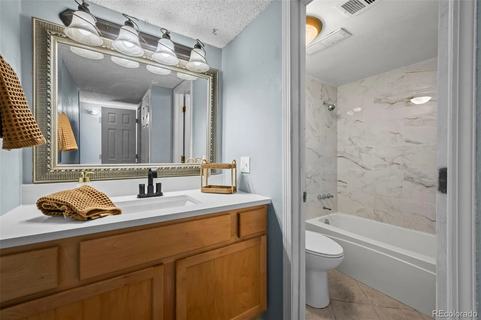 3121 S Tamarac Drive #K 106 Denver CO 80231 | MLS #REC9073901 08152026005523 1600 10