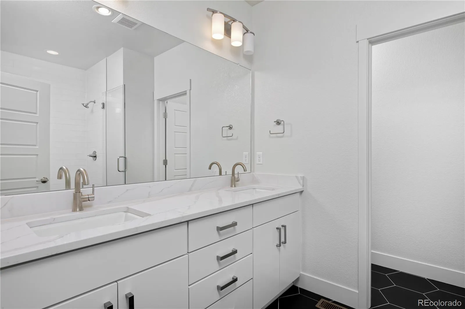 3119 W Bates Avenue Denver CO 80236 | MLS #REC9077989 08052026213516 1600 5