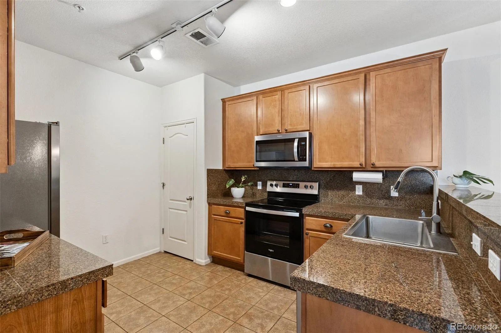 7140 Simms Street #102 Arvada CO 80004 | MLS #REC9103059 07292026160849 1600 8