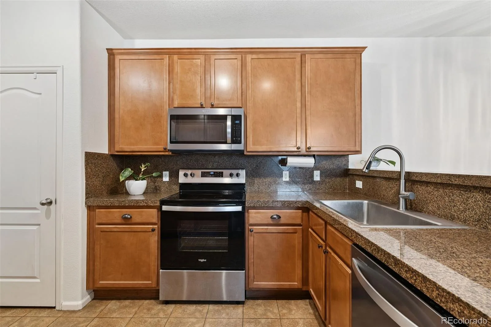 7140 Simms Street #102 Arvada CO 80004 | MLS #REC9103059 07292026160849 1600 9