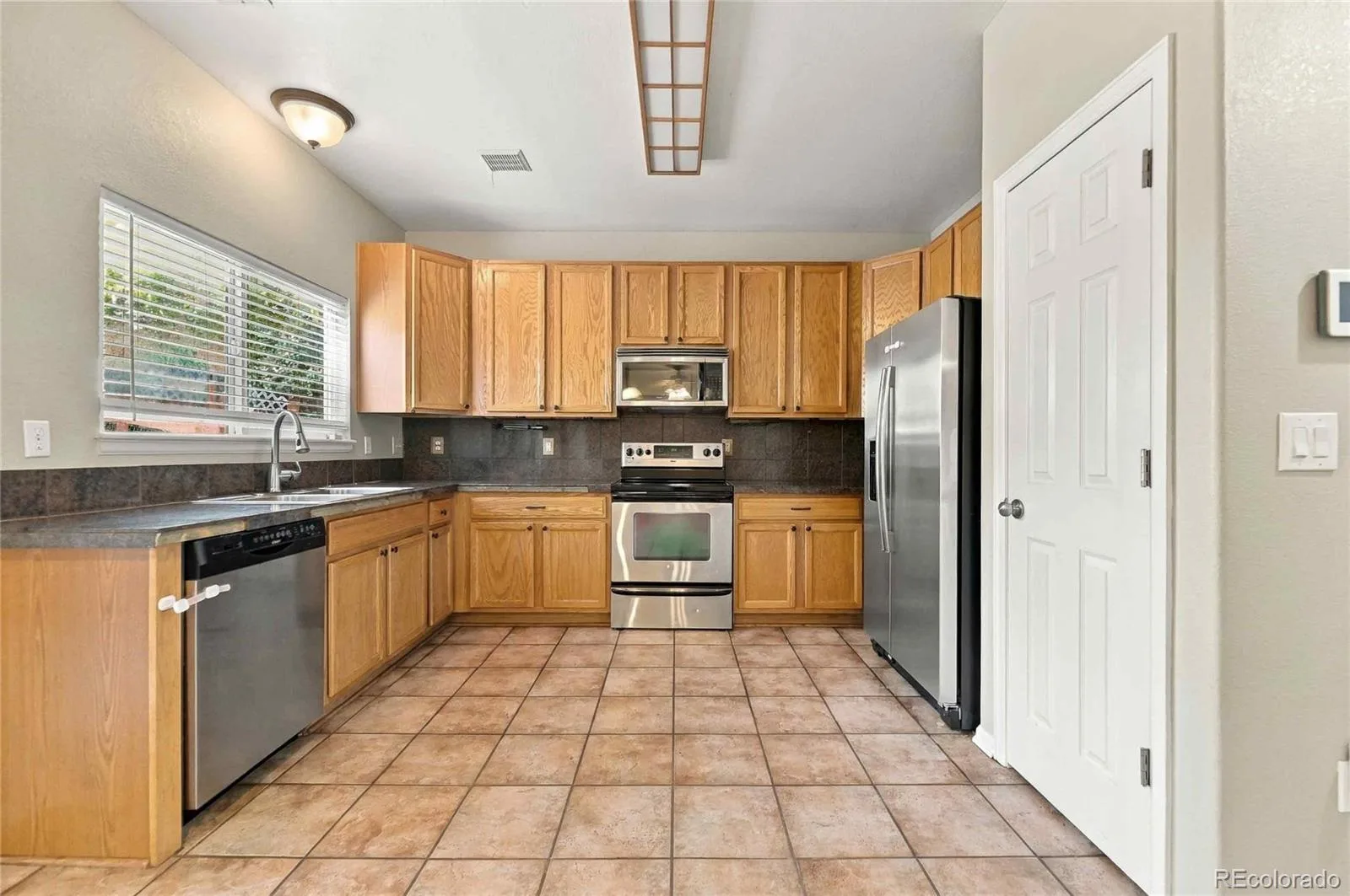 19408 E 59th Aurora CO 80019 | MLS #REC9108825 09222026142030 1600 5