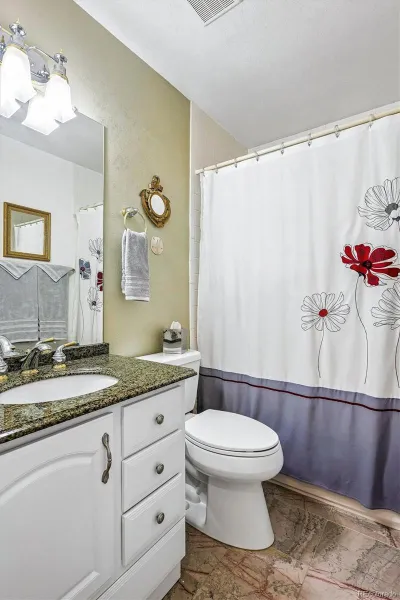 1050 S Monaco Parkway #99 Denver CO 80224 MLS #REC9258612 05222026000756 800 23