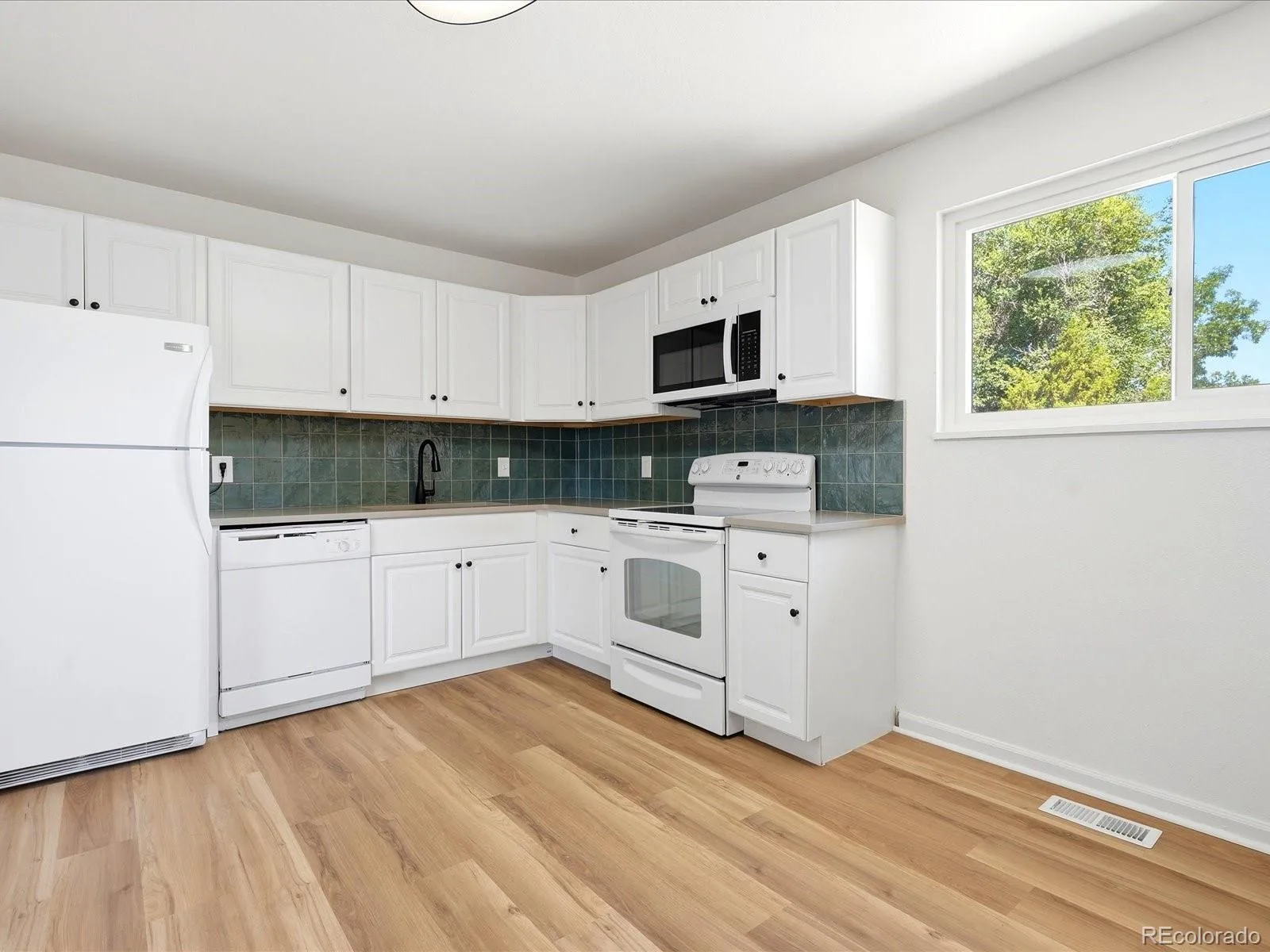 12265 E 55th Avenue Denver CO 80239 | MLS #REC9313108 07292026173442 1600 11