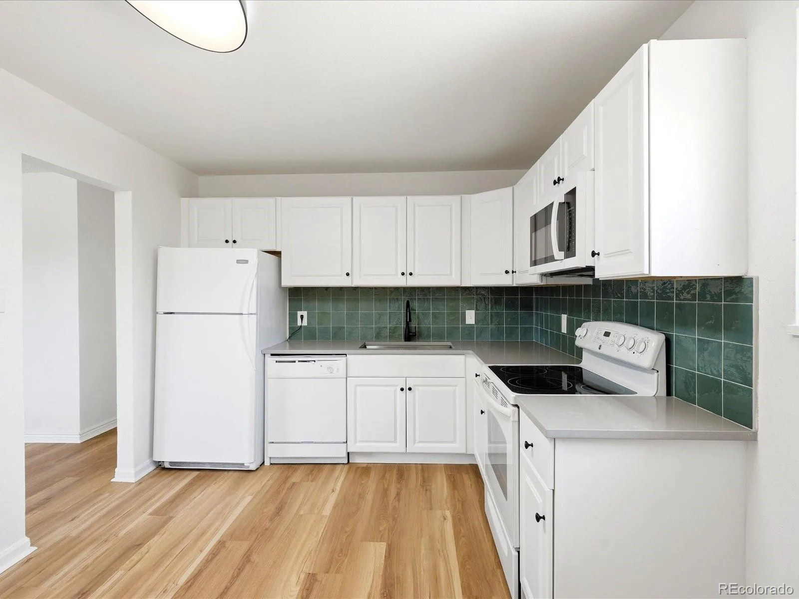 12265 E 55th Avenue Denver CO 80239 | MLS #REC9313108 07292026173442 1600 13