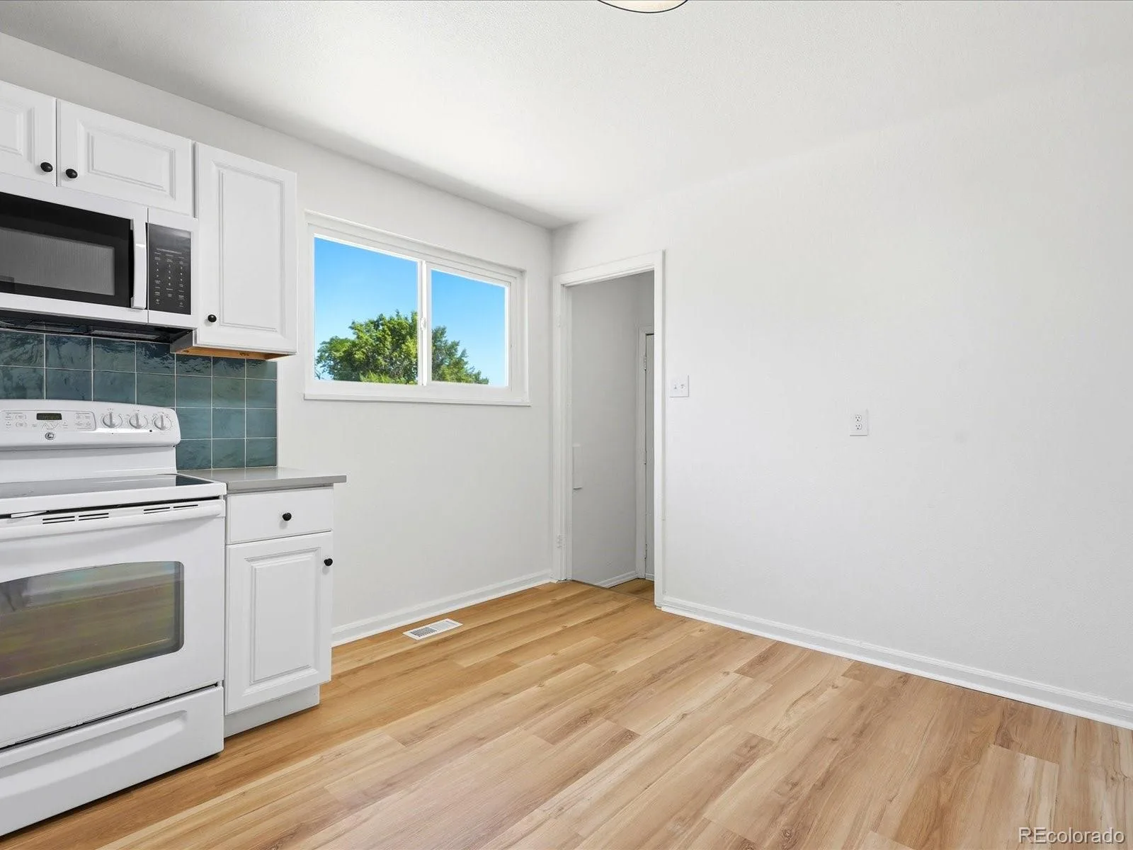 12265 E 55th Avenue Denver CO 80239 | MLS #REC9313108 07292026173442 1600 18