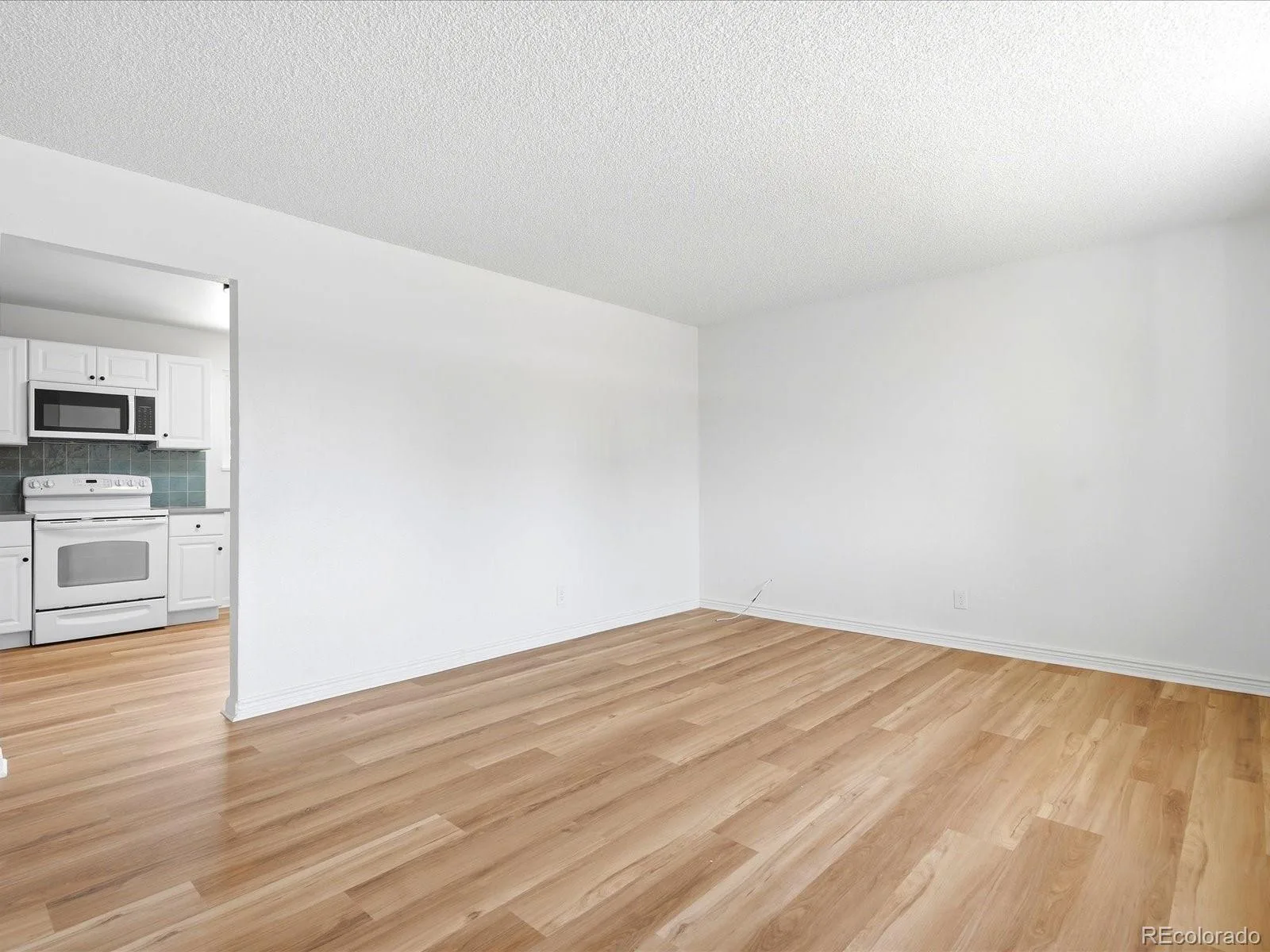 12265 E 55th Avenue Denver CO 80239 | MLS #REC9313108 07292026173442 1600 7
