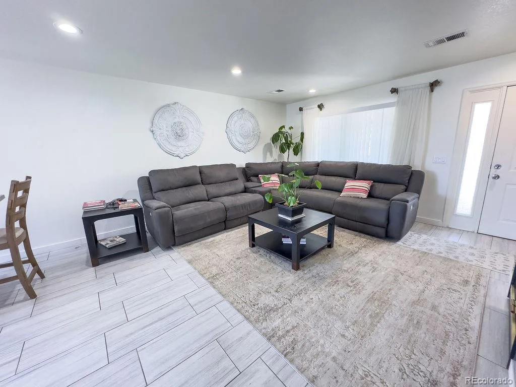 19163 E Wyoming Drive #105 Aurora CO 80017 MLS #REC9319084 07212026235406 1024 3