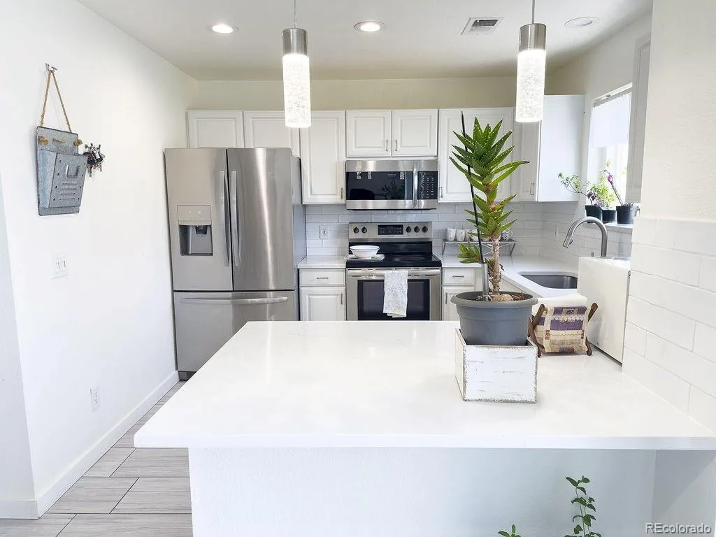 19163 E Wyoming Drive #105 Aurora CO 80017 MLS #REC9319084 07212026235406 1024 4