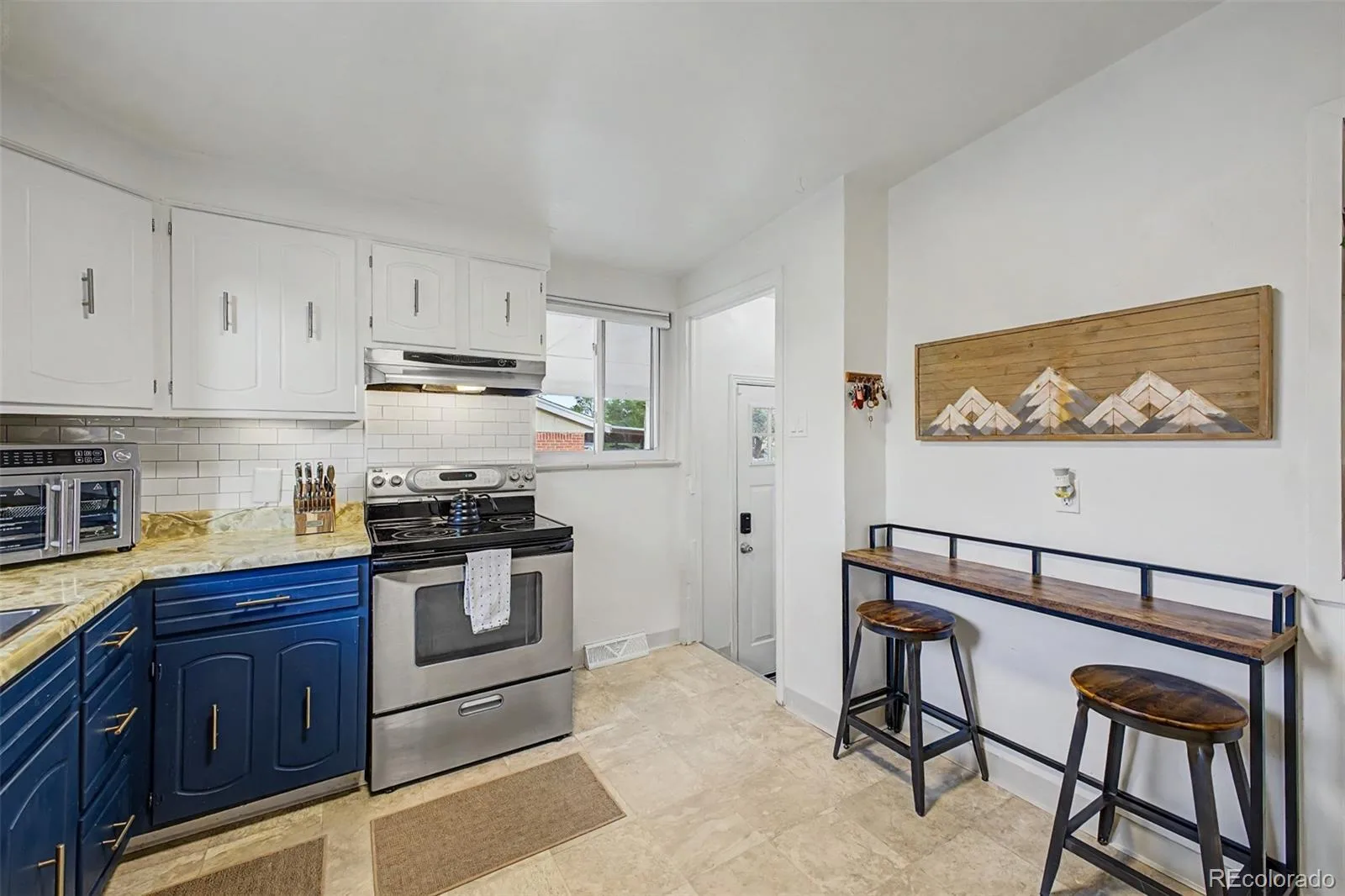1940 Mcdougal Street Denver CO 80229 | MLS #REC9356226 07232026021633 1600 9