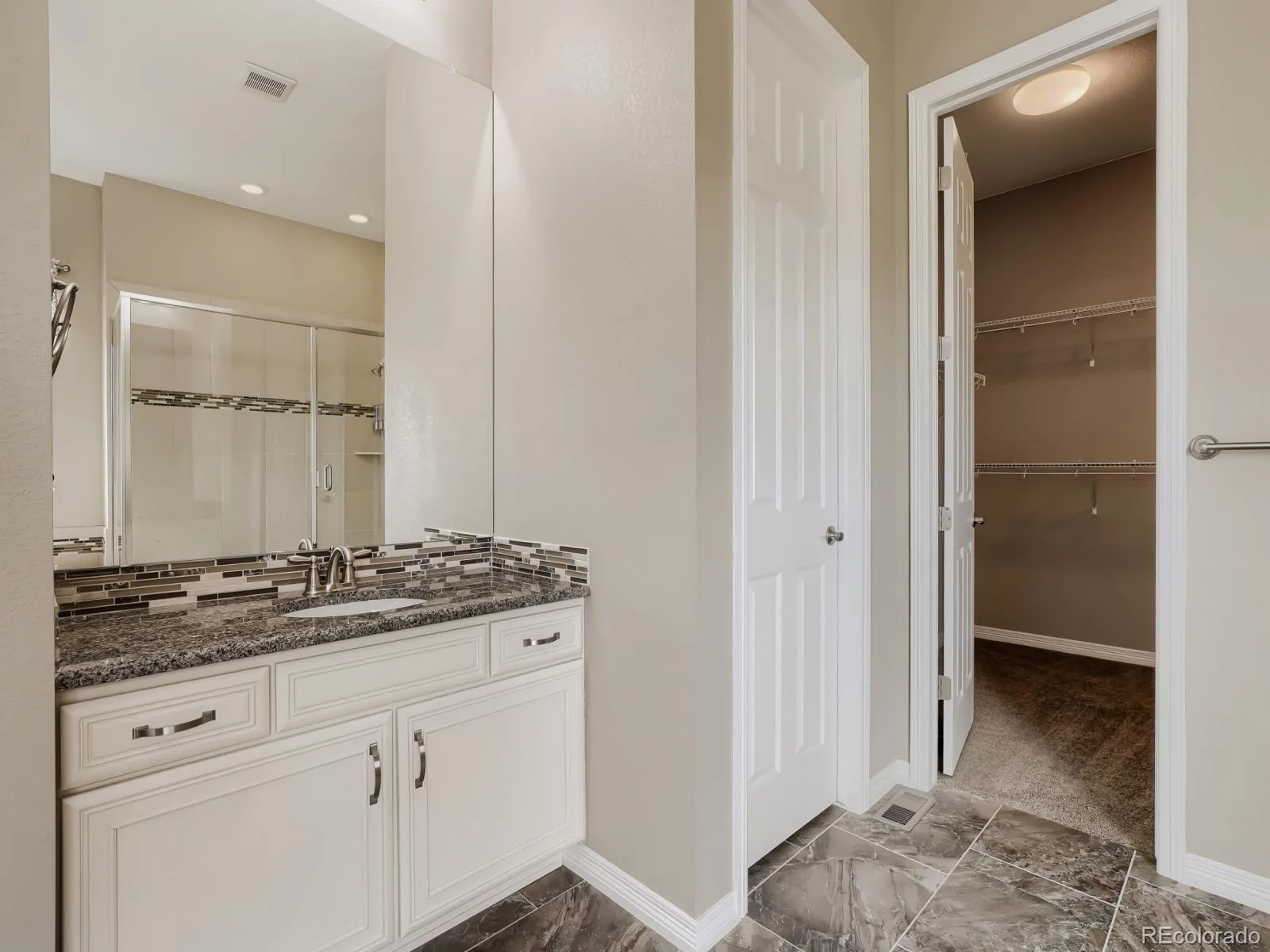 8450 S Biloxi Court Aurora CO 80016 | MLS #REC9388603 08042026200539 1600 14