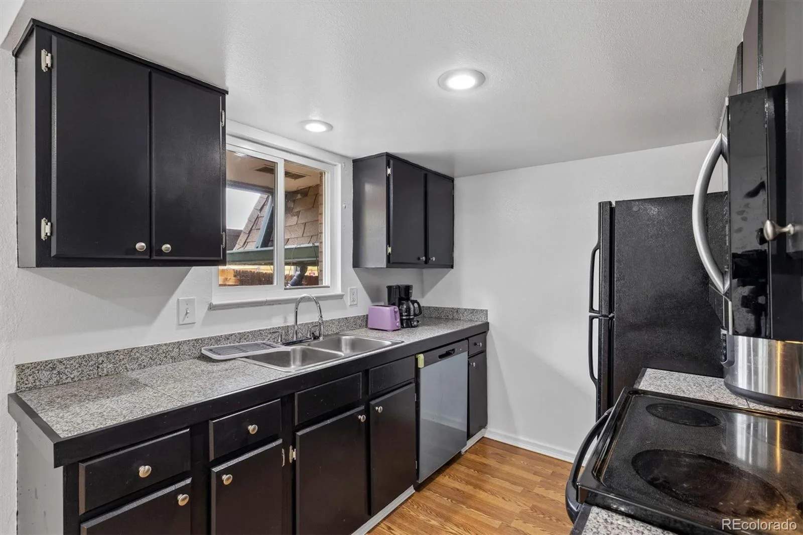 7711 W GLASGOW Place Littleton CO 80128 | MLS #REC9510175 06262026223816 1600 11