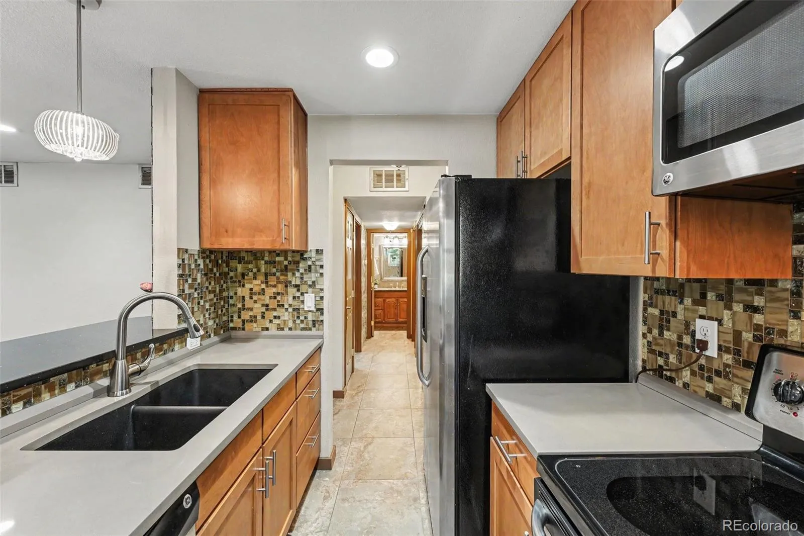 9727 E Peakview Avenue #A03 Englewood CO 80111 MLS #REC9522426 05142026155623 1600 18