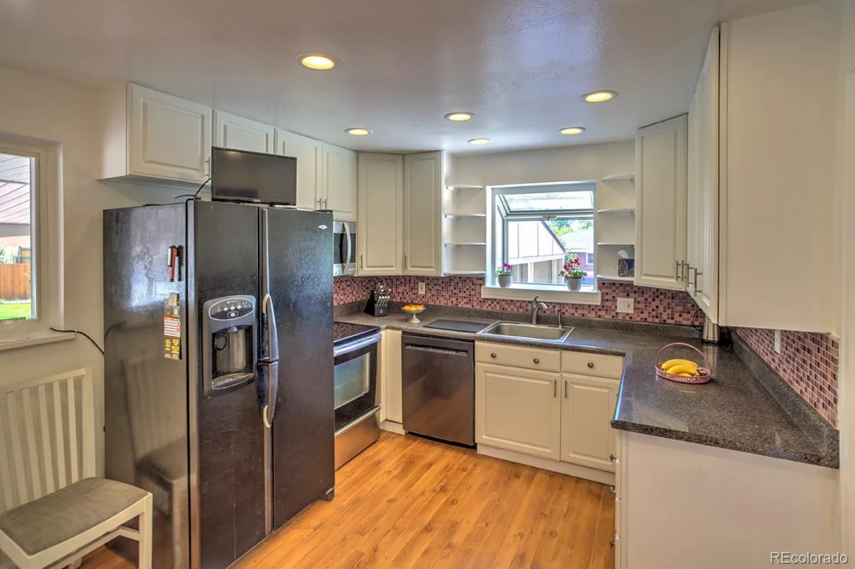 6034 S Milwaukee Way Centennial CO 80121 | MLS #REC9529767 09242026230238 1200 7