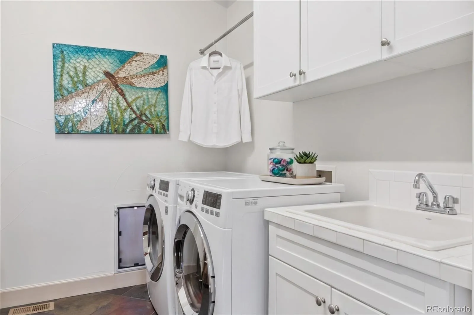 2335 N Glencoe Street Denver CO 80207 MLS #REC9585307 05152026201650 1600 23
