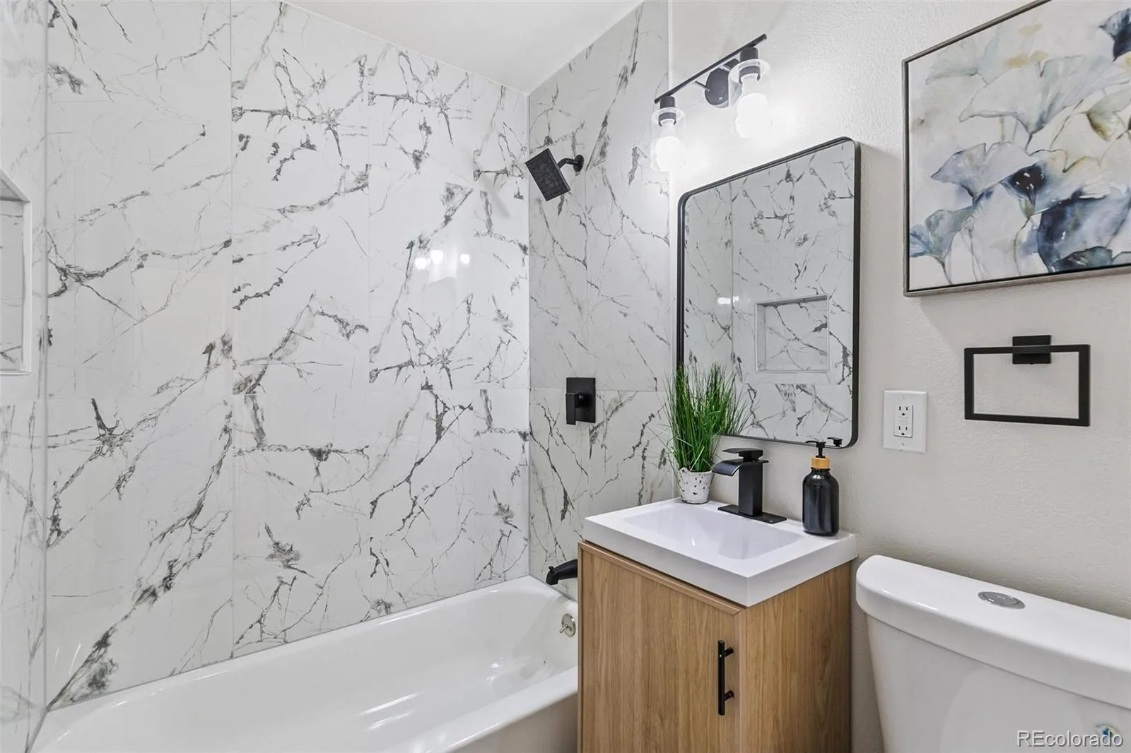 1657 Macon Street Aurora CO 80010 MLS #REC9655596 07032026163930 1600 11