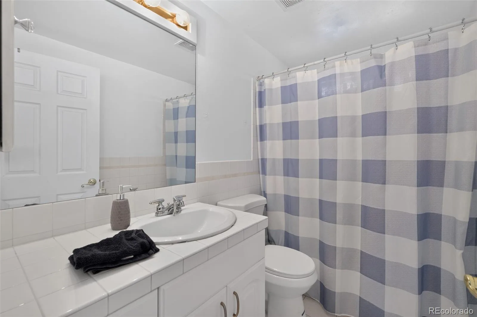 1580 S Knox Court Denver CO 80219 | MLS #REC9762708 07302026162828 1600 20