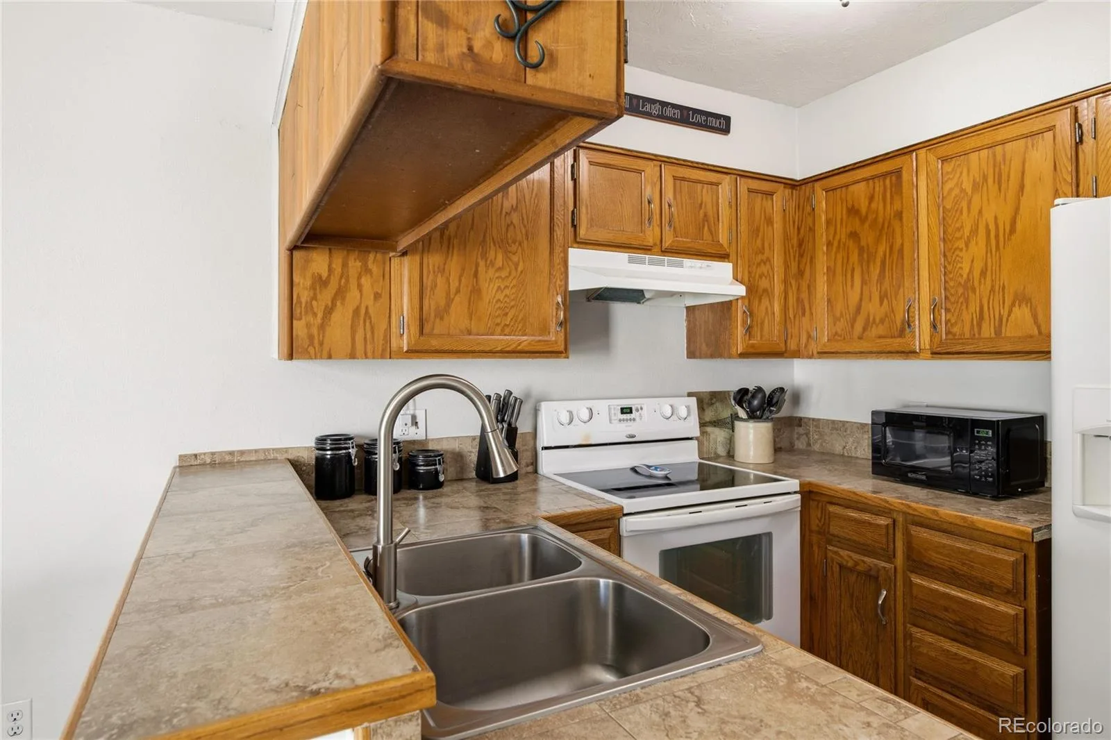 8805 W Floyd Avenue Lakewood CO 80227 | MLS #REC9773882 08102026155053 1600 9