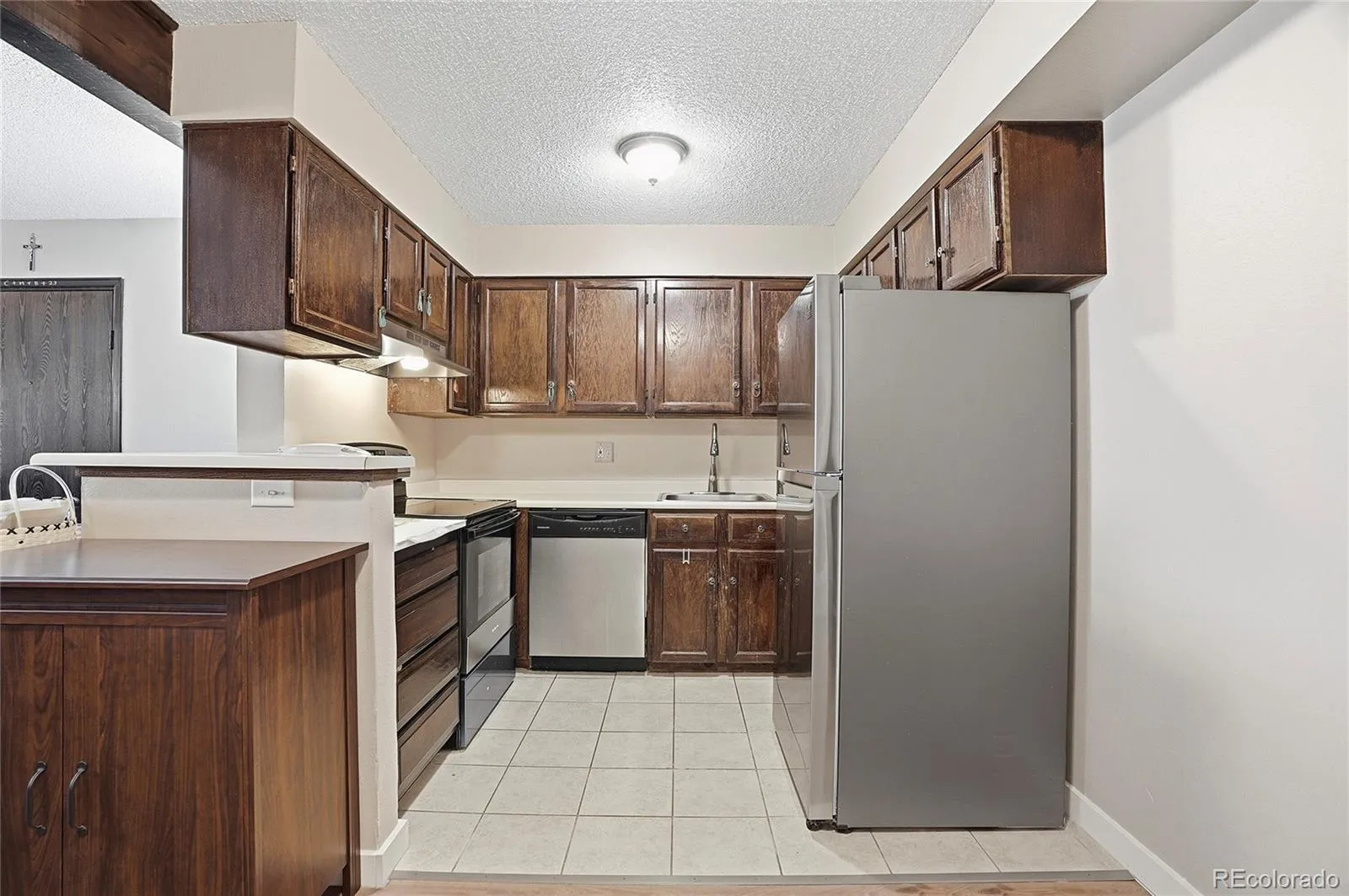 11983 E Harvard Avenue #106 Aurora CO 80014 MLS #REC9791649 04042026023538 1600 9