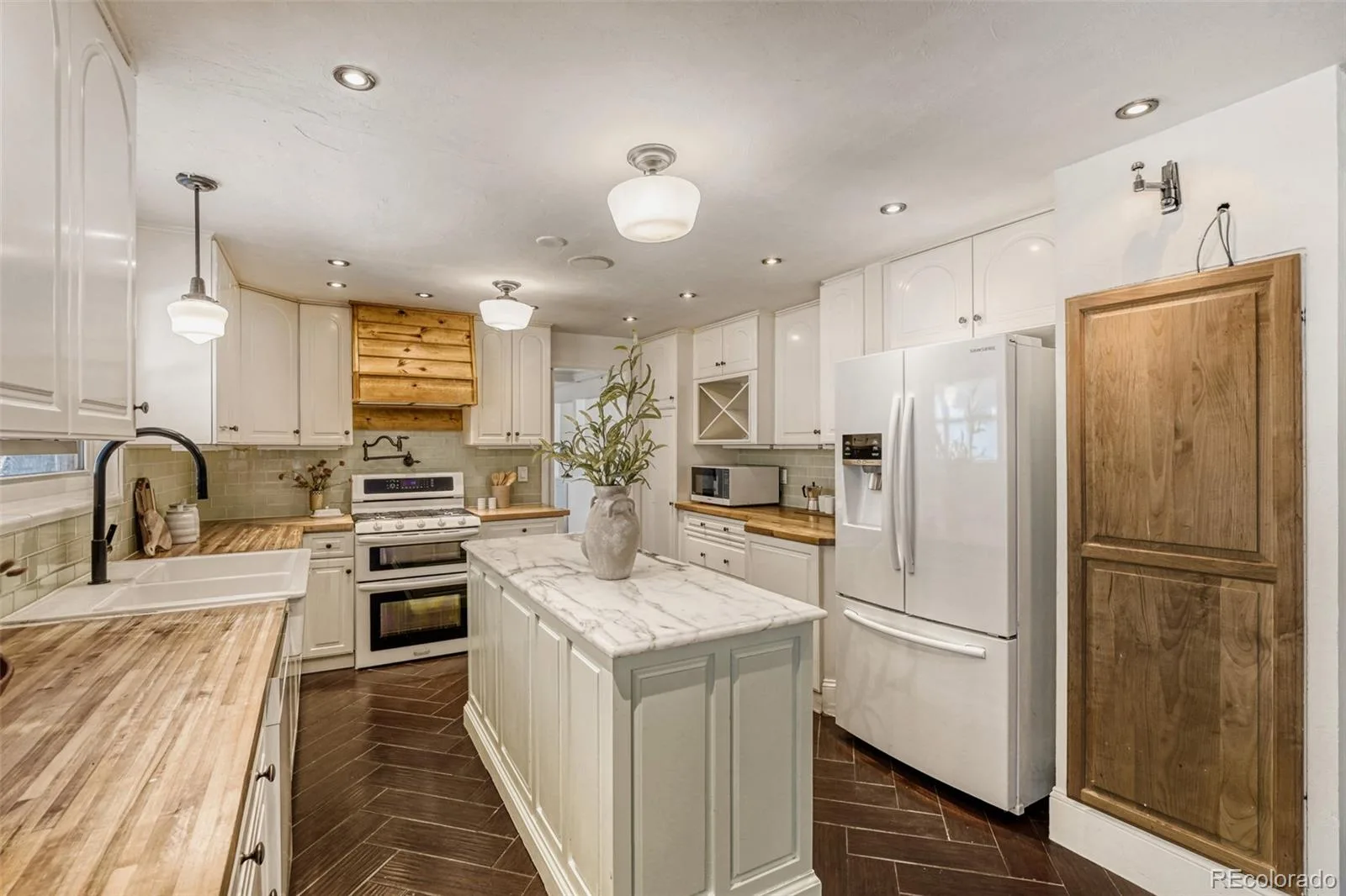 8709 E Kenyon Avenue Denver CO 80237 | MLS #REC9831335 08202026033546 1600 9
