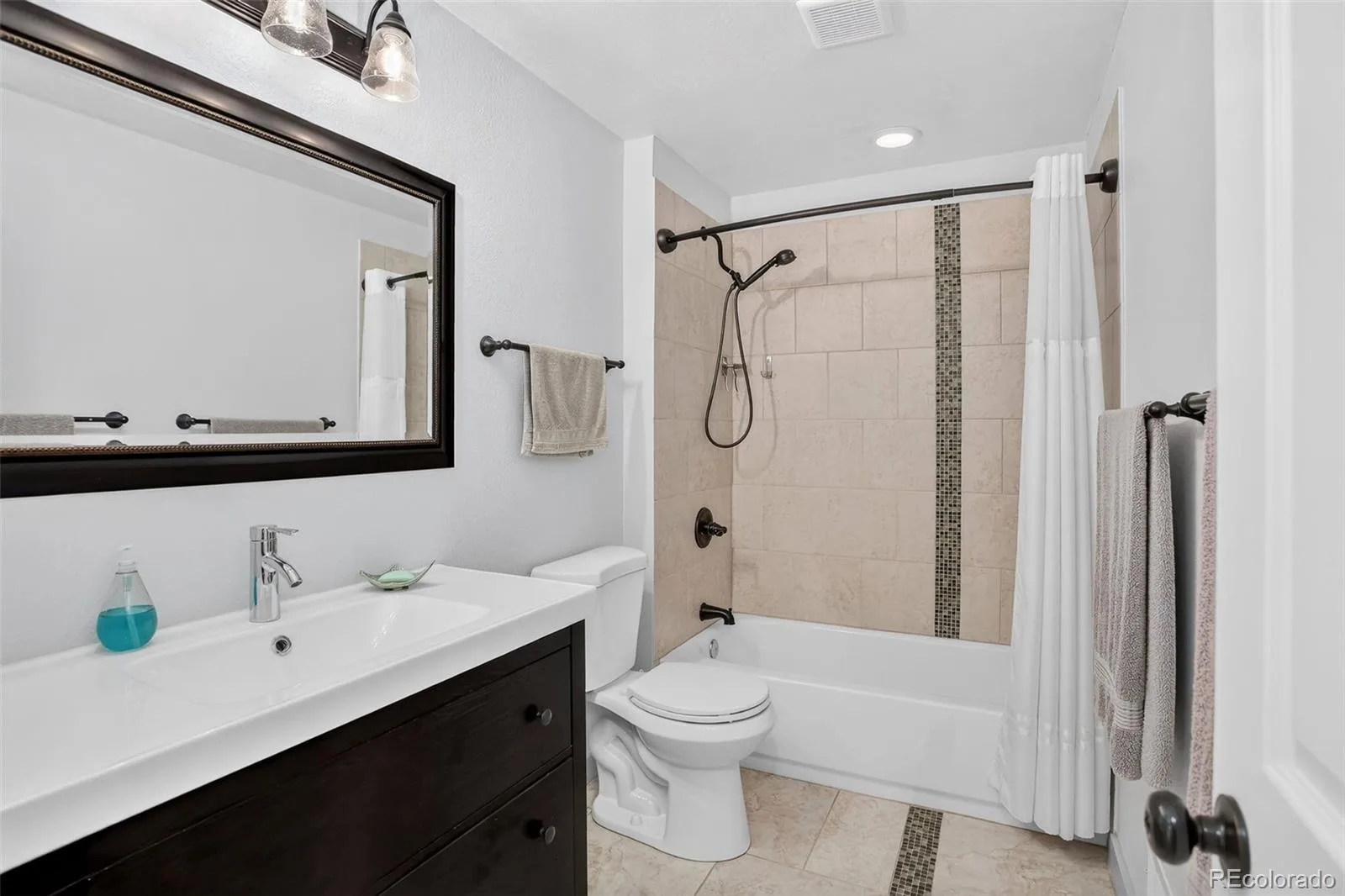 901 S Locust Street Denver CO 80224 | MLS #REC9834623 08182026162803 1600 25