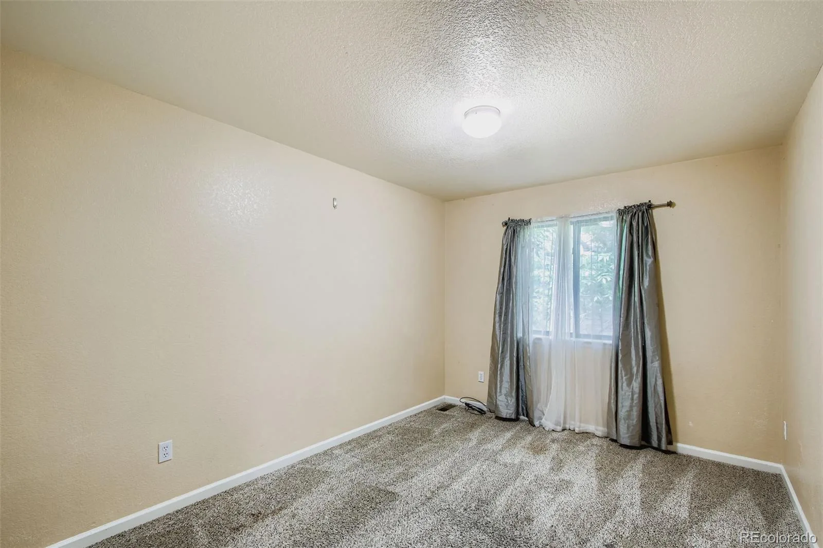 10693 W 63rd Drive #102 Arvada CO 80004 | MLS #REC9892071 06122026232444 1600 10