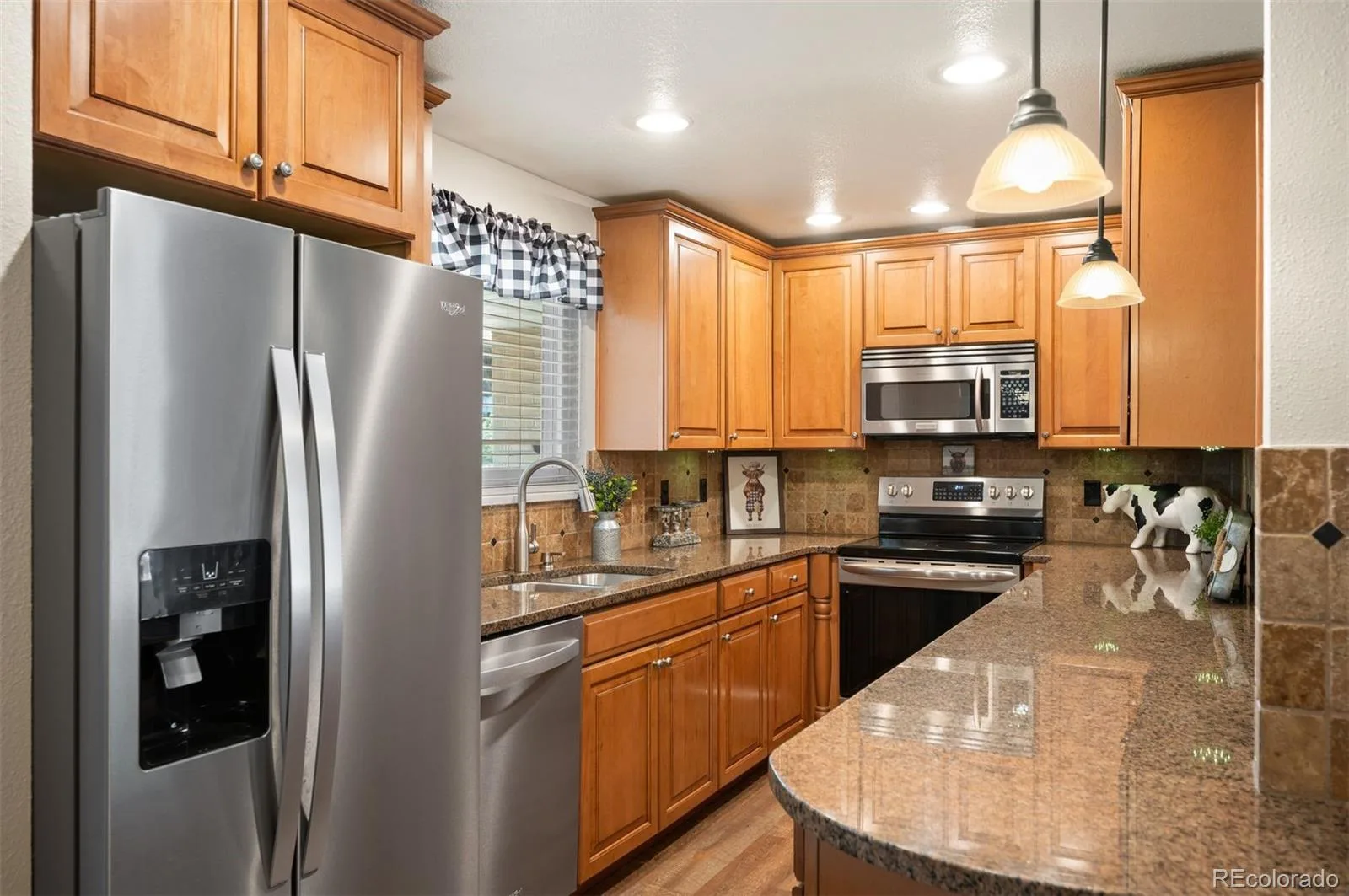 7024 Owens Street Arvada CO 80004 | MLS #REC9918367 08112026025327 1600 11