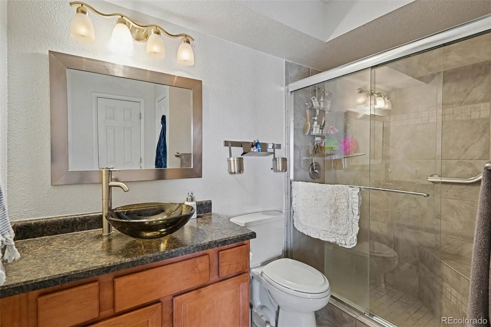 3825 S Monaco Parkway #212 Denver CO 80237 MLS #REC9929661 07152026222422 1600 24