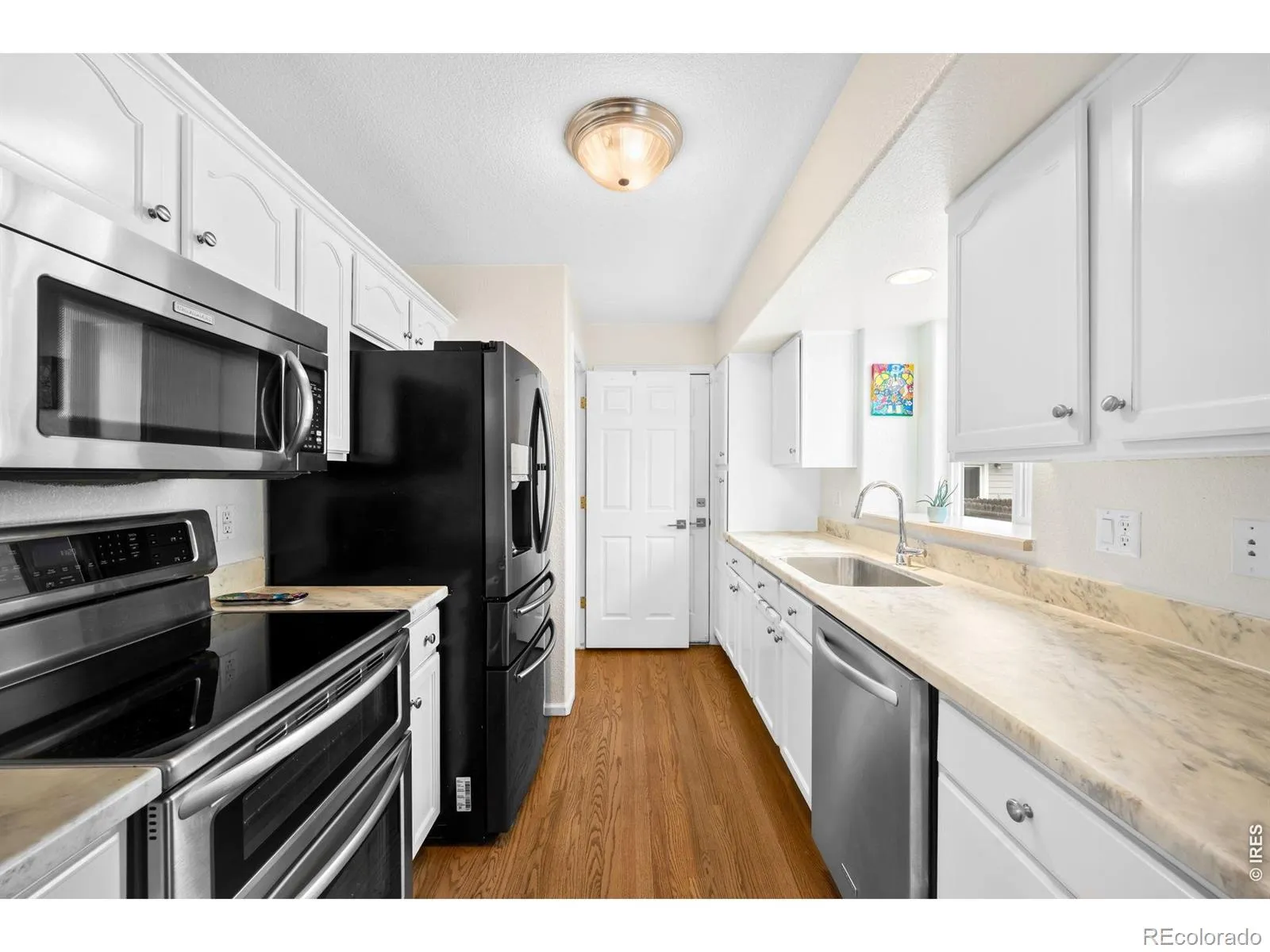9559 E Iowa Circle Denver CO 80247 MLS #RECIR1058378 05062026235018 1600 8