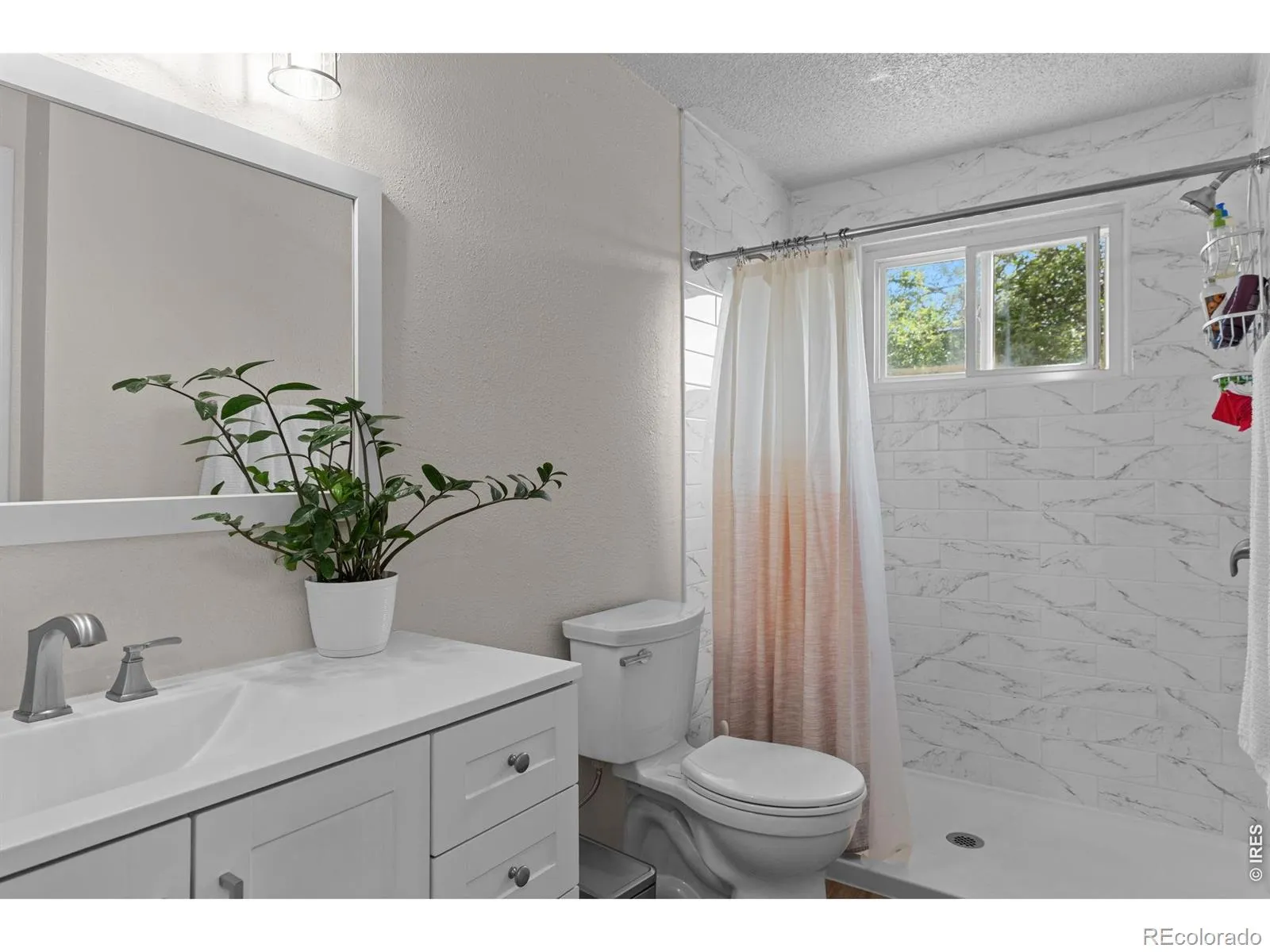 927 E 4th Avenue Longmont CO 80504 MLS #RECIR1059650 05212026190740 1600 18