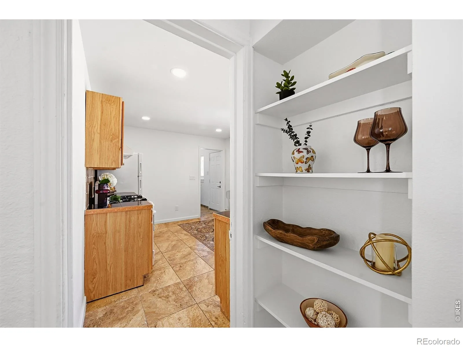 1902 Kenton Street Aurora CO 80010 | MLS #RECIR1062208 08112026003748 1600 19