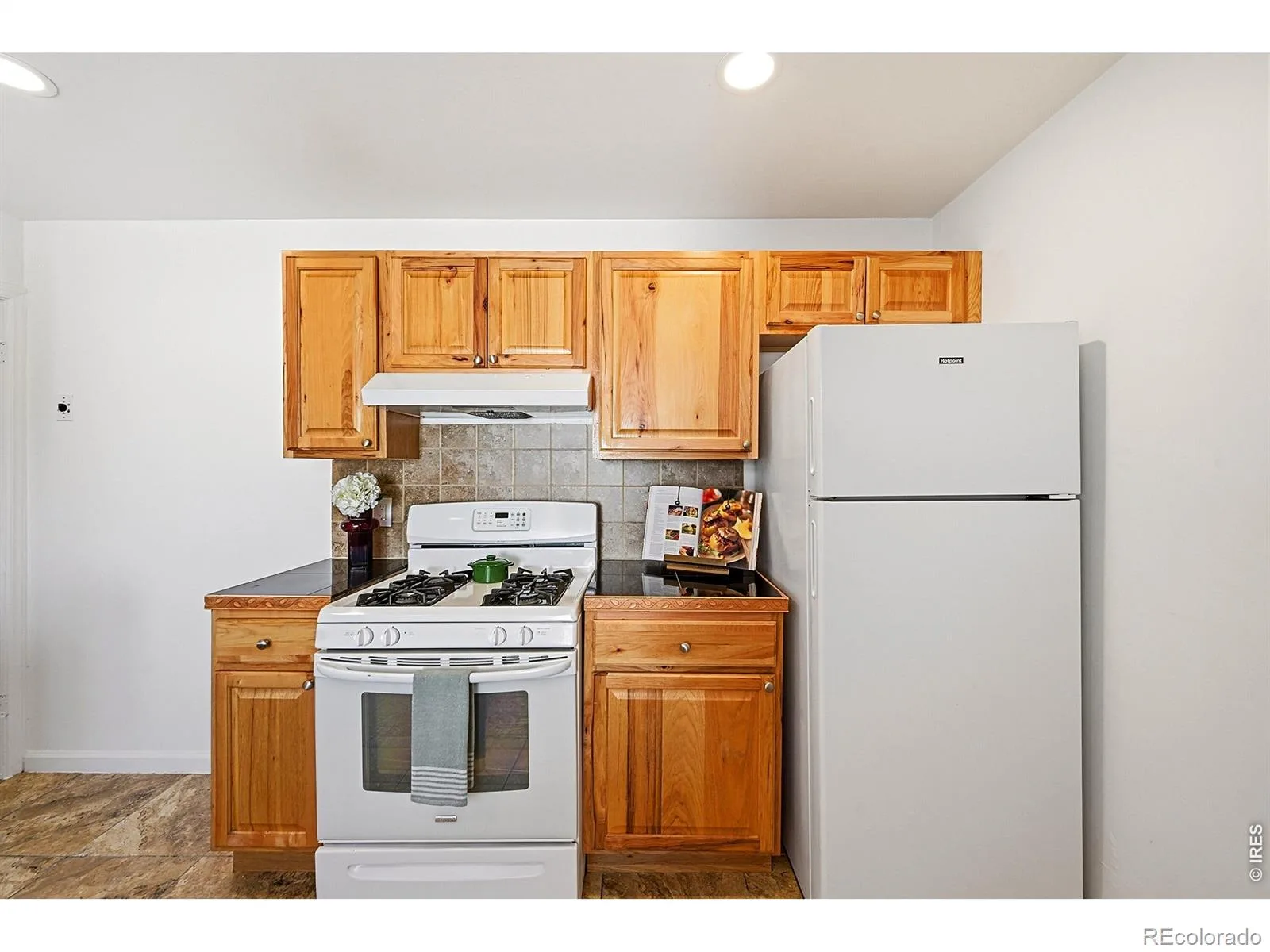 1902 Kenton Street Aurora CO 80010 | MLS #RECIR1062208 08112026003748 1600 8