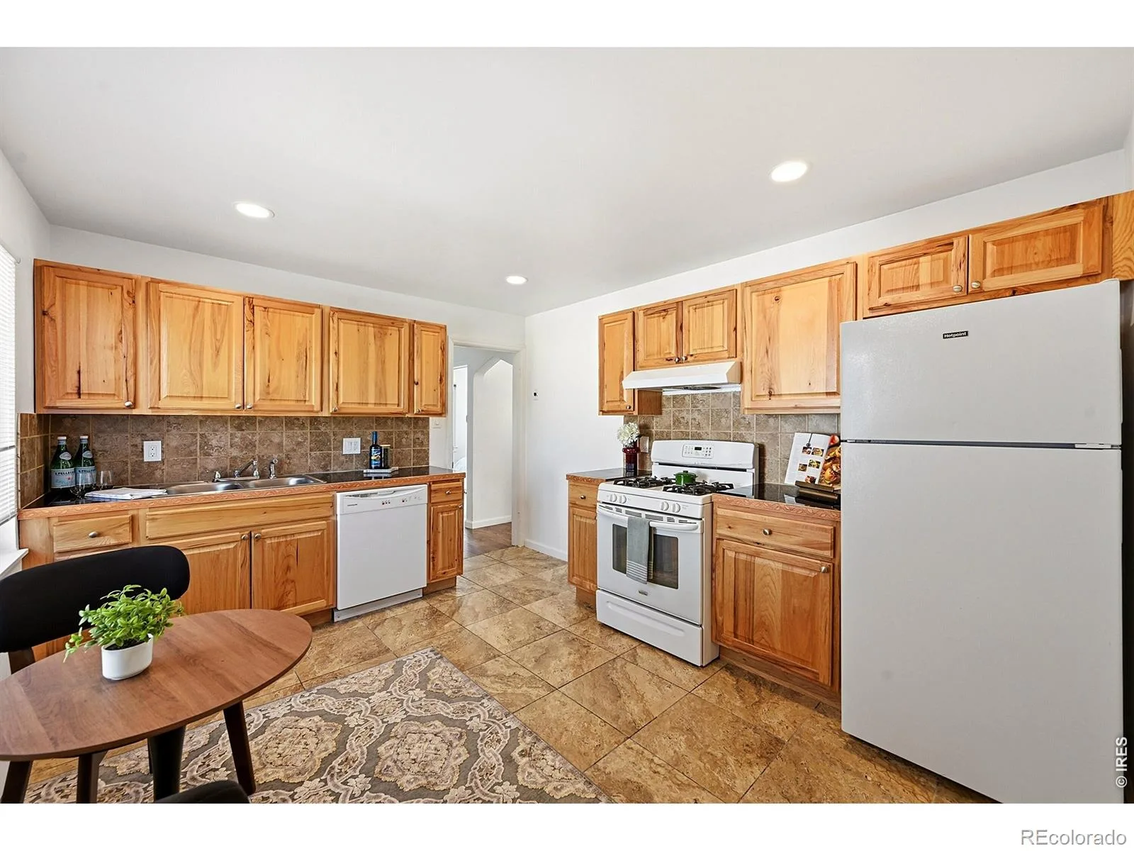 1902 Kenton Street Aurora CO 80010 | MLS #RECIR1062208 08112026003748 1600 9