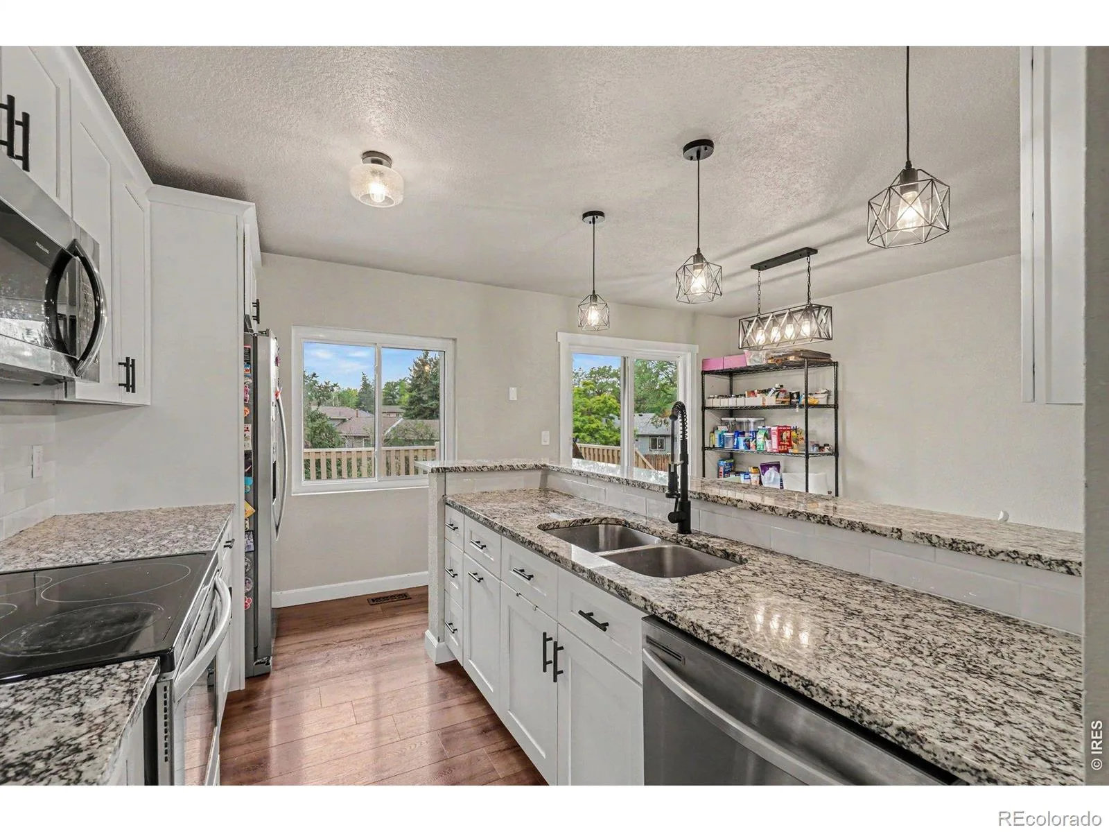 911 Harrison Drive Lafayette CO 80026 | MLS #RECIR1063583 07082026165538 1600 3
