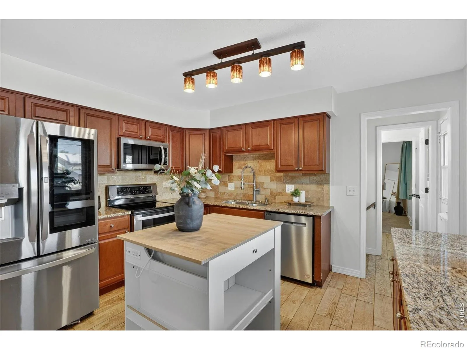 1348 S Drexel Way Lakewood CO 80232 | MLS #RECIR1066332 08132026001627 1600 6