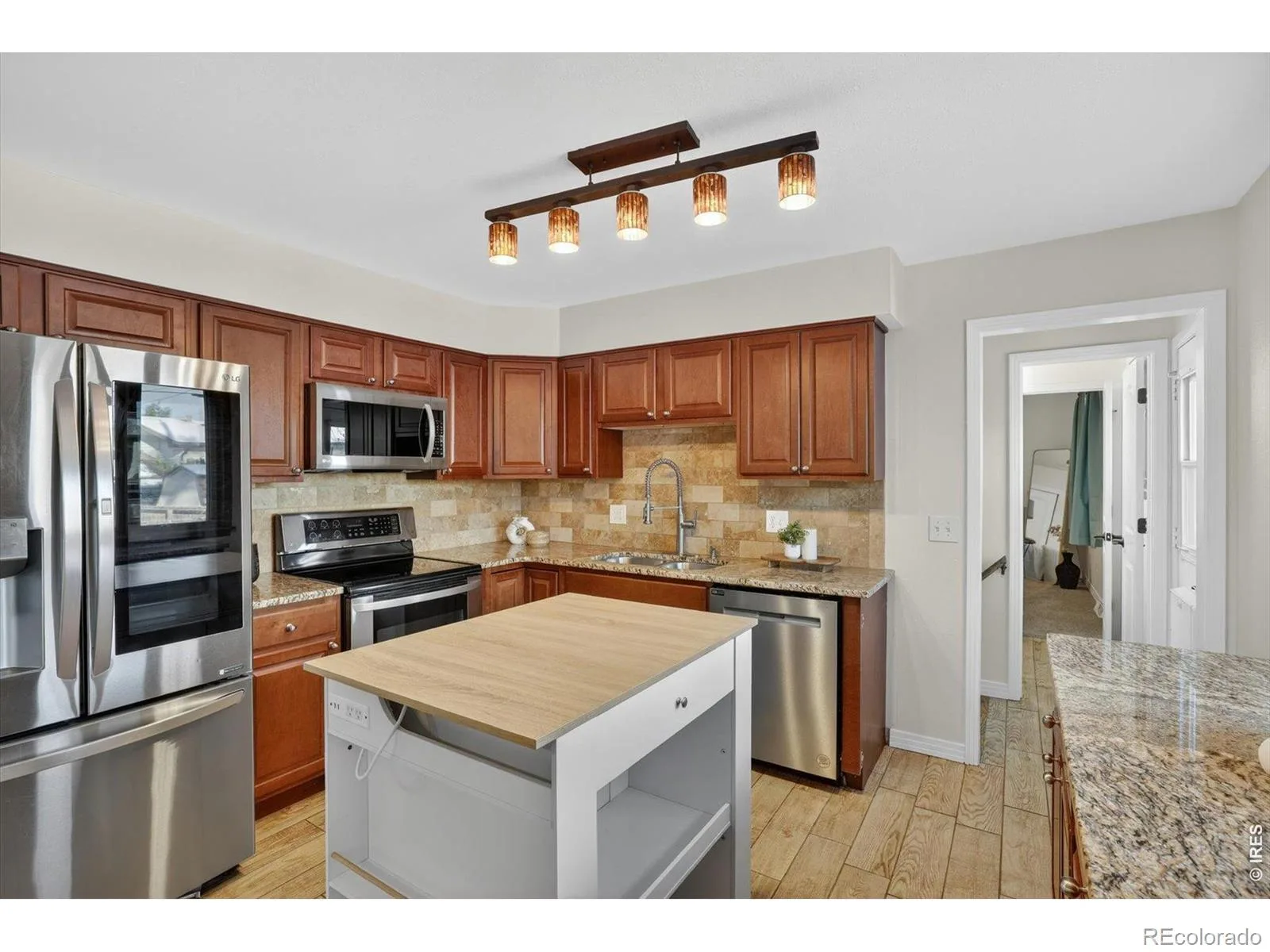 1348 S Drexel Way Lakewood CO 80232 | MLS #RECIR1066332 08132026001627 1600 7