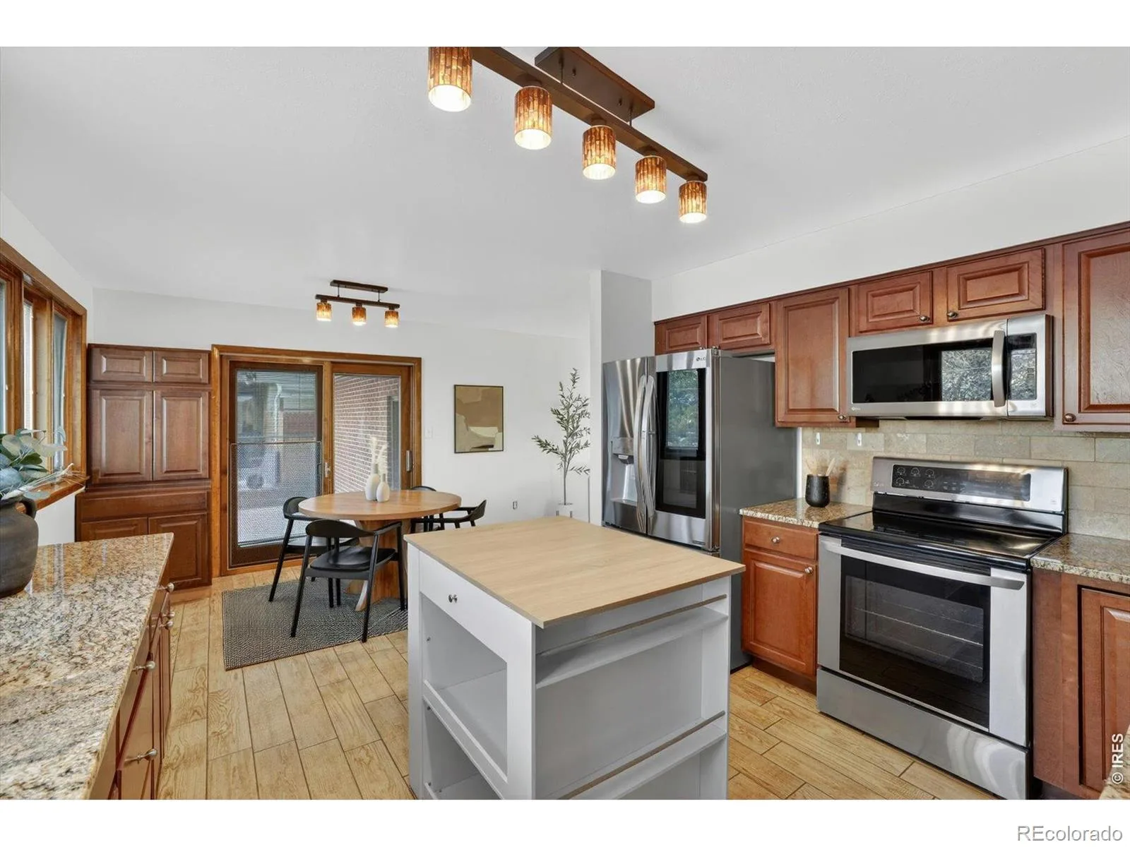 1348 S Drexel Way Lakewood CO 80232 | MLS #RECIR1066332 08132026001627 1600 8