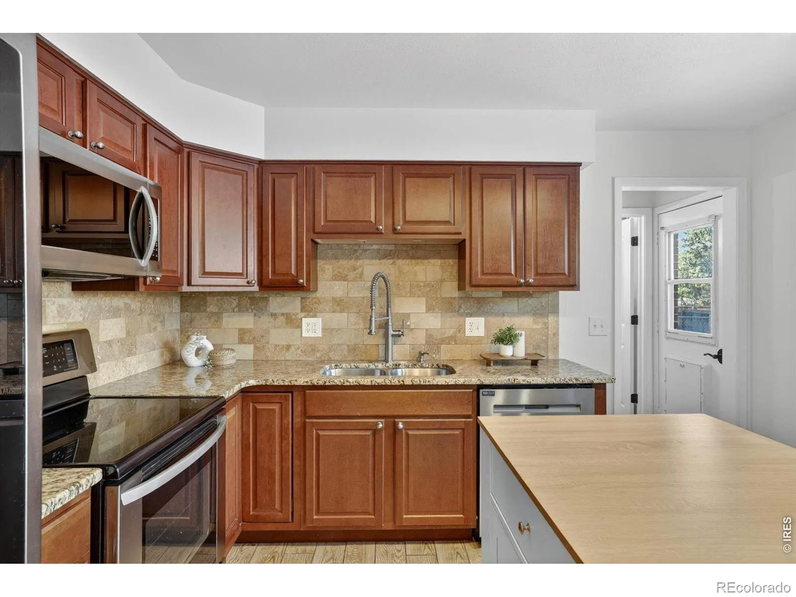 1348 S Drexel Way Lakewood CO 80232 | MLS #RECIR1066332 08132026001627 1600 9